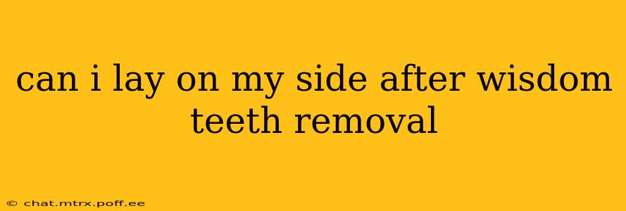 can i lay on my side after wisdom teeth removal