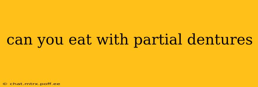 can you eat with partial dentures